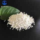 Anhydrous calcium chloride spheroids